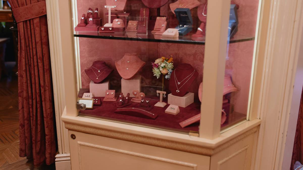 how to display jewelry boxes on a floating shelf with soft backlighting