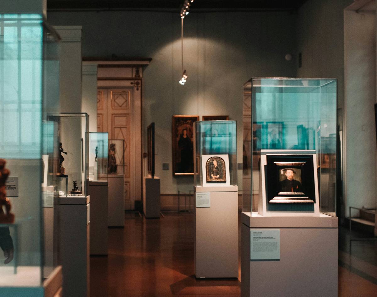 Elegant wooden display case showing how to display the container with curated objects inside